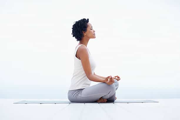 black woman meditating