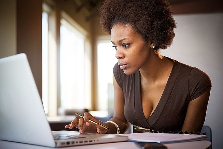 Black Women Looking At Computer