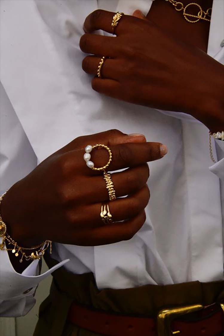 black woman wearing jewelry